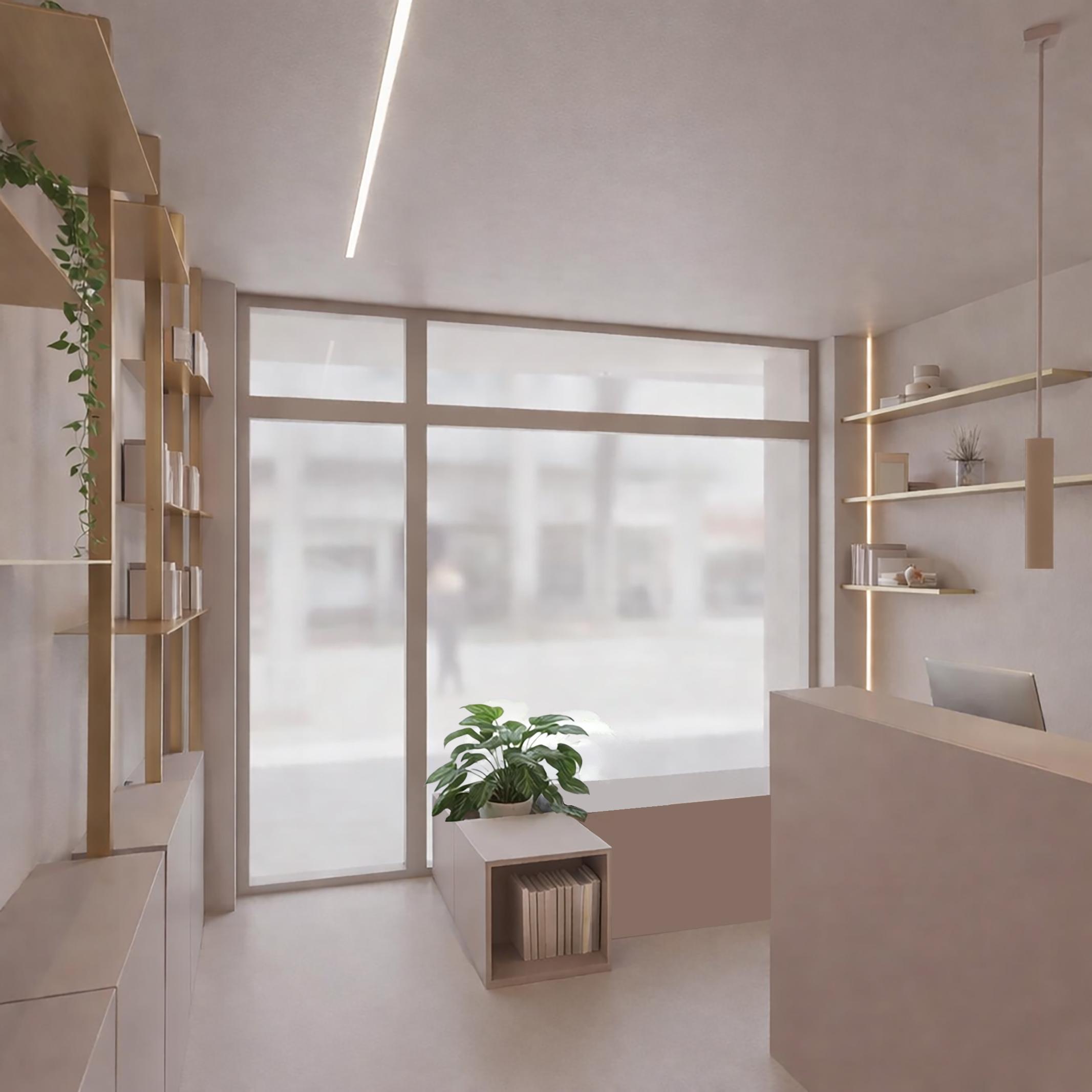 Studio I.A., area reception con vetrata satinata, scaffalature e illuminazione integrata